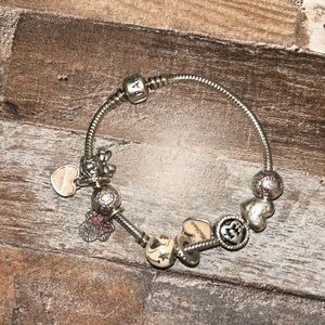 Pandora bracelet. Tons of Disney charms